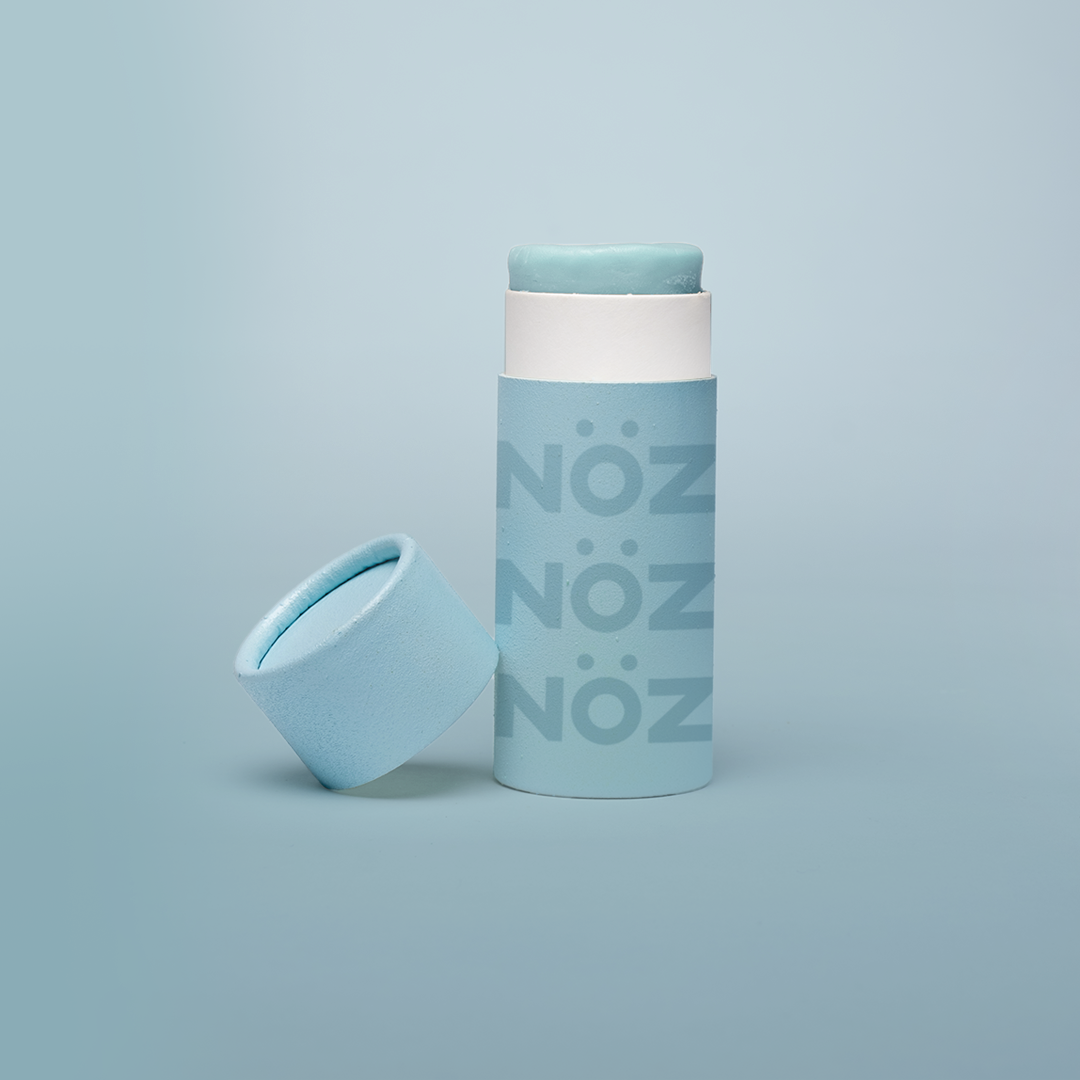 Stick of blue noz sunscreen without cap